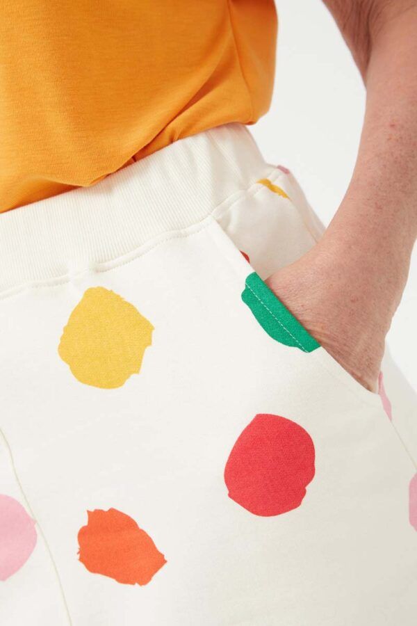 Falda midi en felpa de algodón con estampado de lunares multicolor Macula. Con cintura elástica de tiro medio. Bolsillos laterales. Compañia Fantastica
