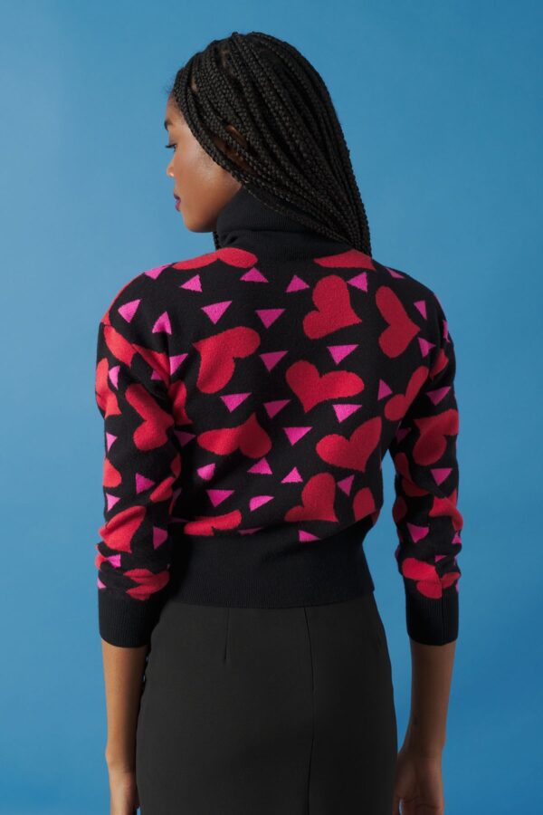 Jersey de punto elástico estampado de corazones. Cuello, puños y cintura en ribete