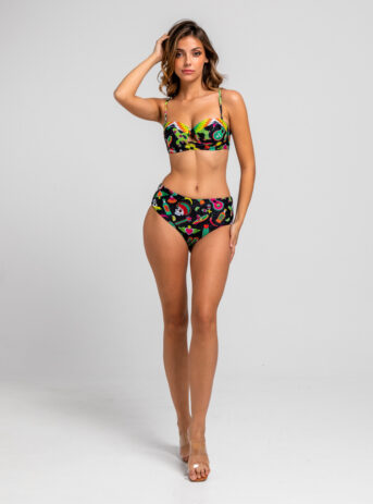 Braga de bikini reversible para mujer, con estampado de calaveras mexicanas sobre fondo negro por un lado y diseño geométrico por el otro. Disponible en Dulce Locura